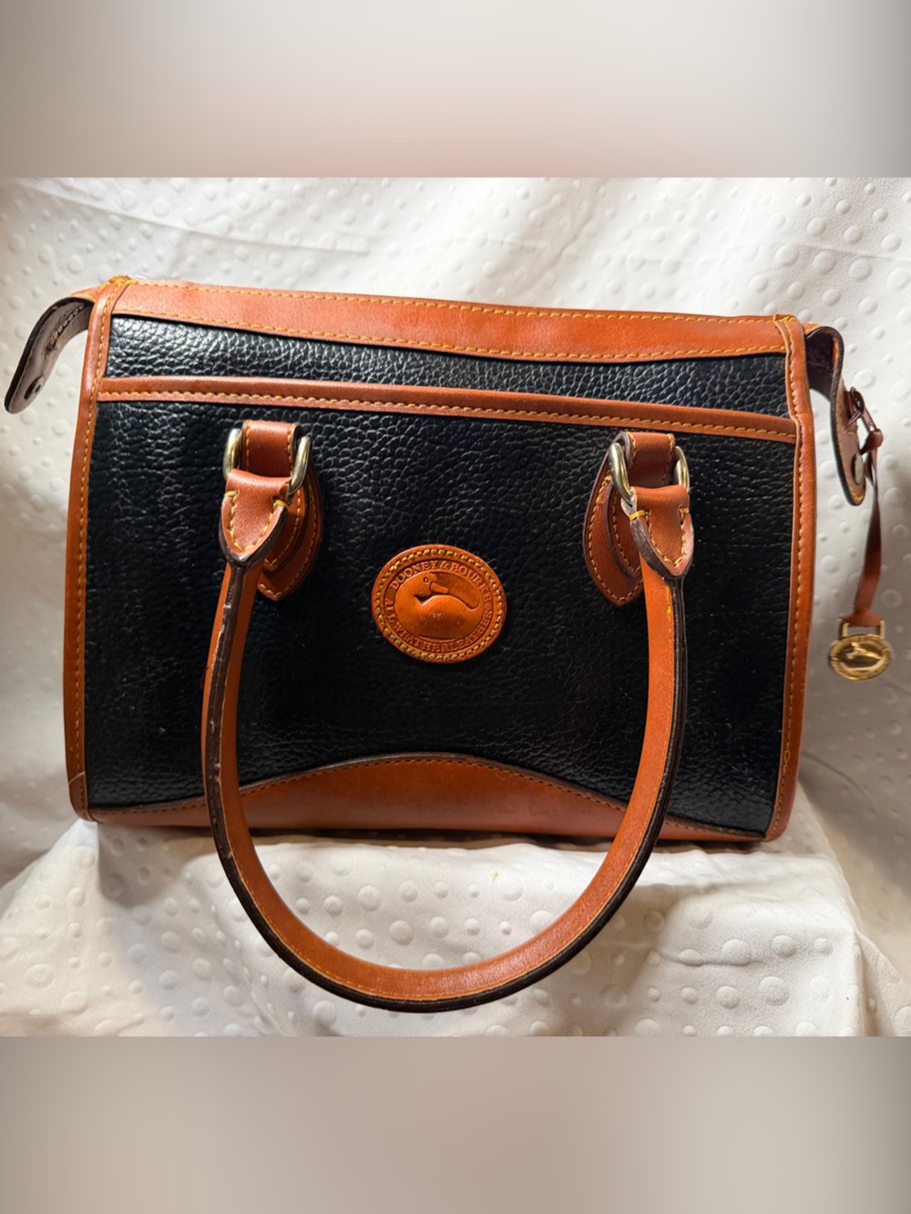 Dooney & Bourke Black with Brown Trim Pebble Leather Satchel